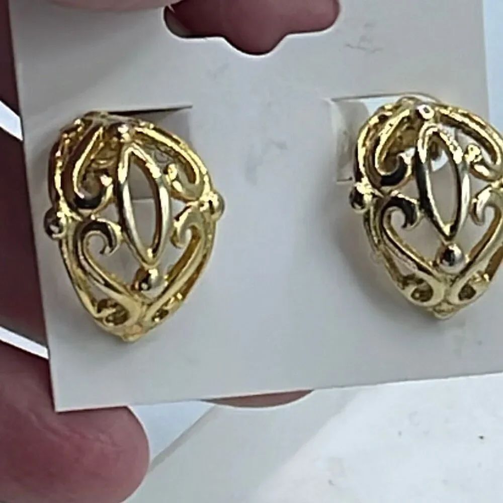 Vintage open cut ornate design clip earrings.